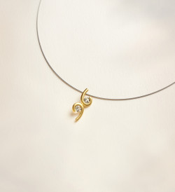 Colgante or Sunrise 22mm amb safir groc 0,52ct